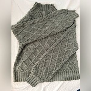 Green American Eagle cropped sweater.